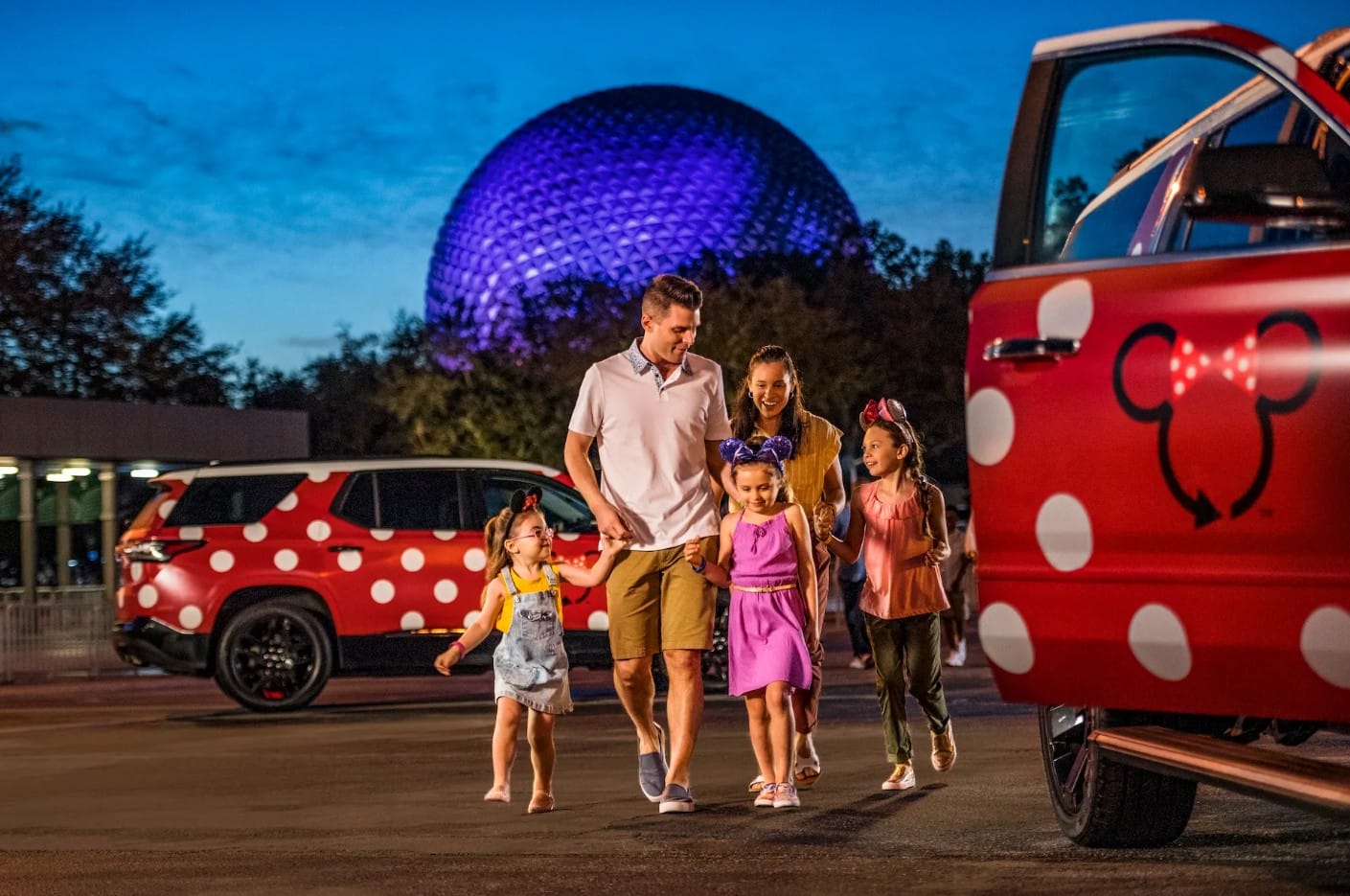 An image of Minnie Vans picking up a family at Epcot
