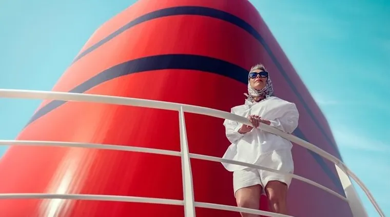 Lady posing for photo on Cunard, luxury cruise line